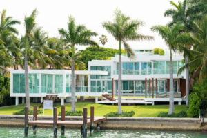 Modern home with impact-resistant flood doors and windows for advanced storm protection.