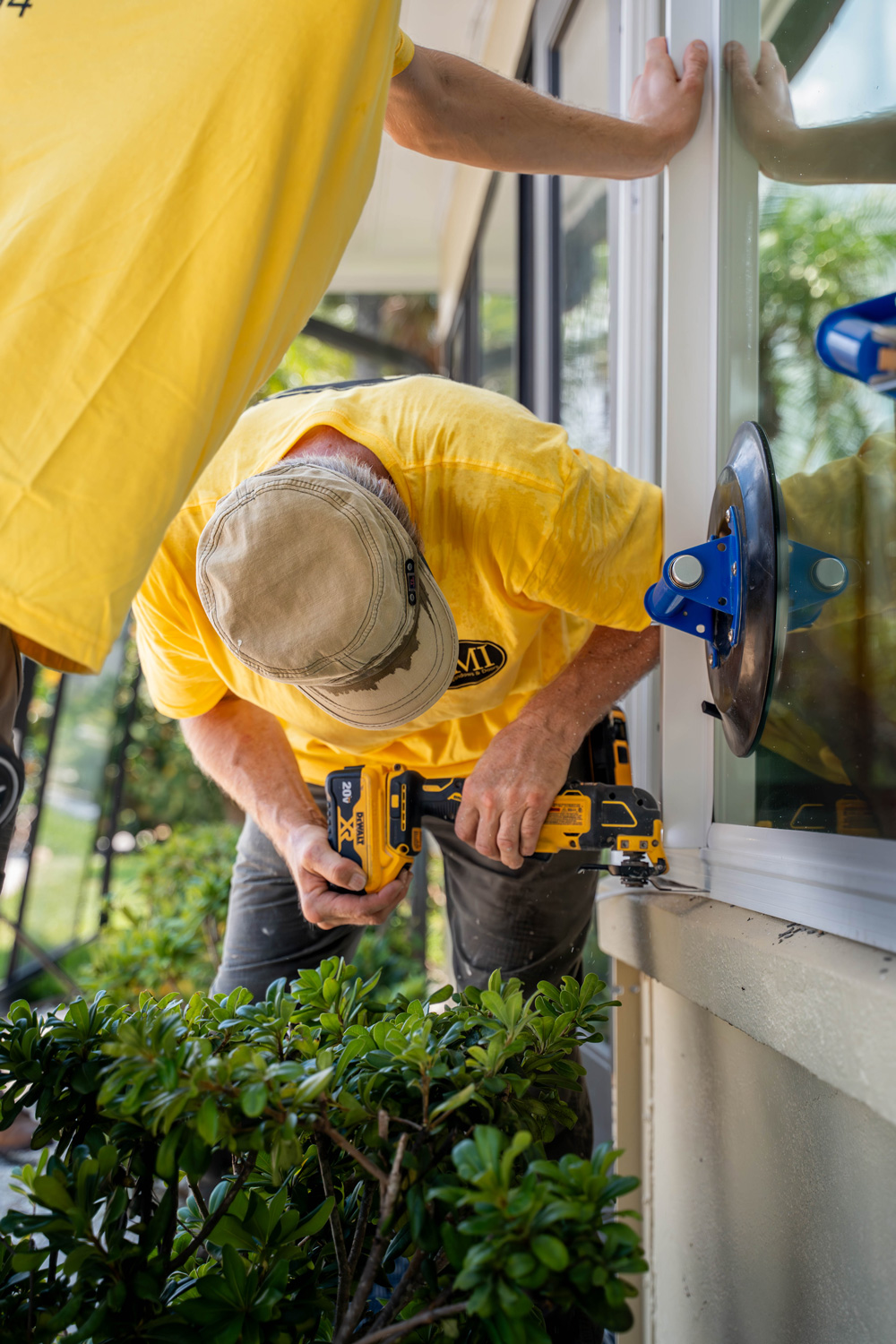 New replacement windows being installed for improved energy efficiency.
