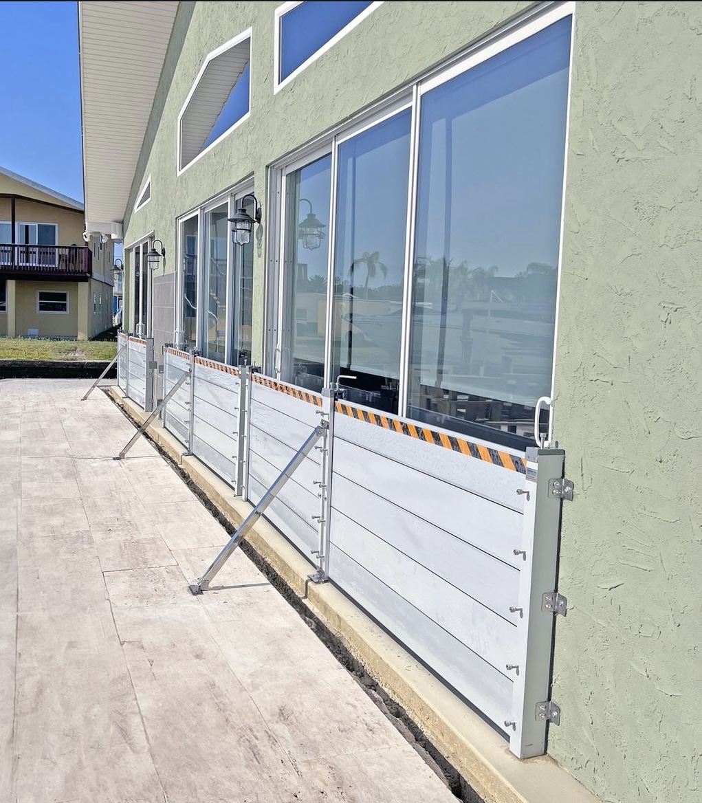 Storm-resistant home in Florida with impact windows and flood barriers, benefiting from My Safe Florida Home improvements.